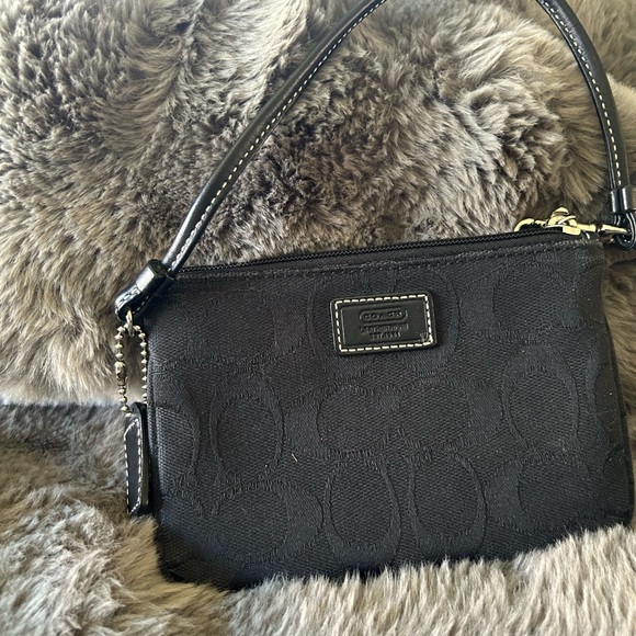 Coach Handbags - Coach Black Embossed Wristlet